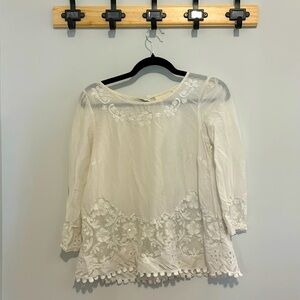 Beautiful white blouse with flower embroidery